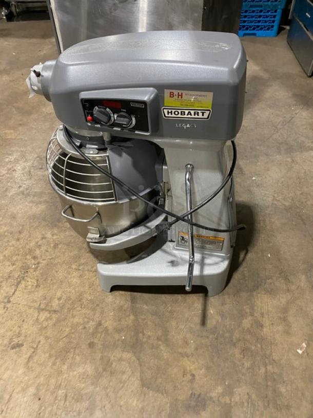 Hobart Legacy Series 20 Qt. Mixer, model HL200-1STD, with stainless steel bowl guard and mixing bowl, in good condition.