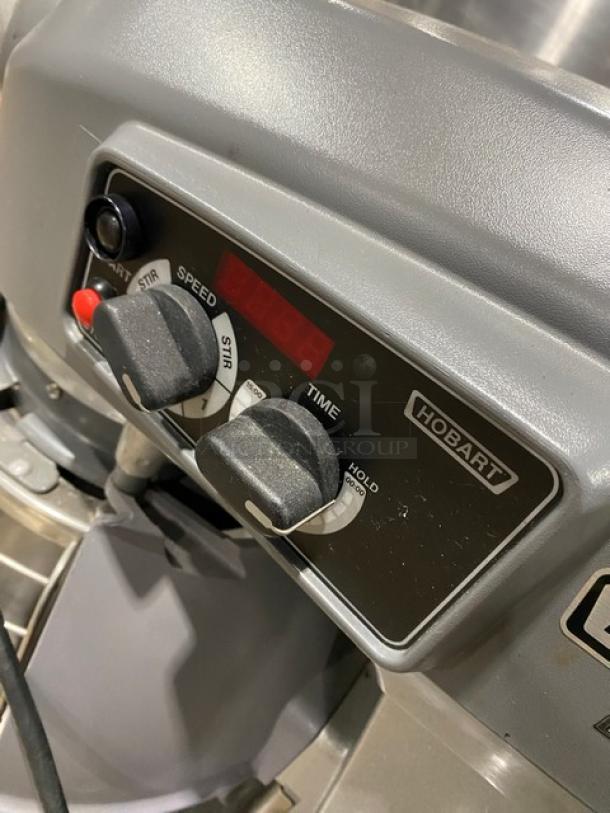 Hobart Legacy HL200-1STD mixer control panel, showing speed and time dials, brand logo, in good condition.