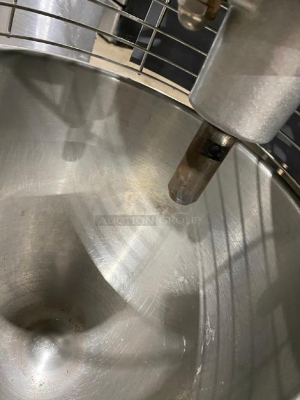 Hobart Legacy Series HL200-1STD 20 Qt. Commercial Mixer, stainless steel bowl, electric, gray, with bowl guard, on legs.