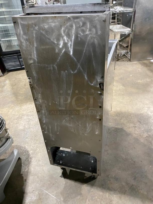 Pantin commercial stainless steel gas-powered deep fat fryer with backsplash, on legs. Used condition, minor scratches visible.