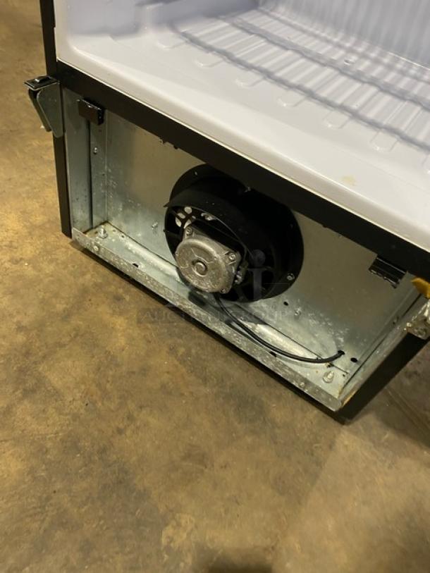 KoolMore MDR-9CP Commercial Refrigerator, interior view showing poly-coated wired rack and fan unit, 115V, black.