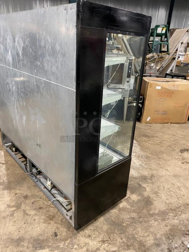 Sanye black multi-tier refrigerated open merchandiser display case, commercial use, visible shelves, minor wear, for grab-n-go items.