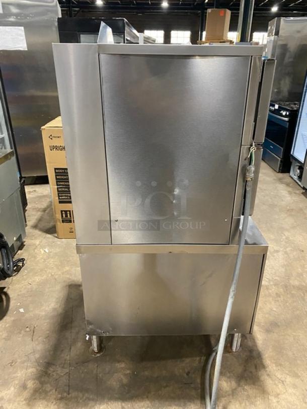 Vulcan VSX24G stainless steel dual compartment convection steamer, natural gas, on legs, with pan rack and individual controls.