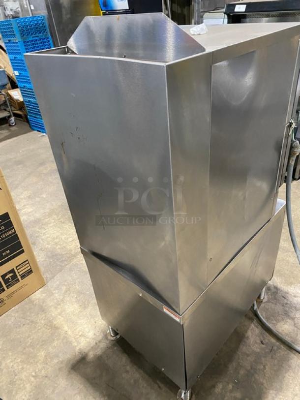 Vulcan VSX24G commercial stainless steel convection steamer, dual compartment, natural gas, with controls and pan rack, on legs.