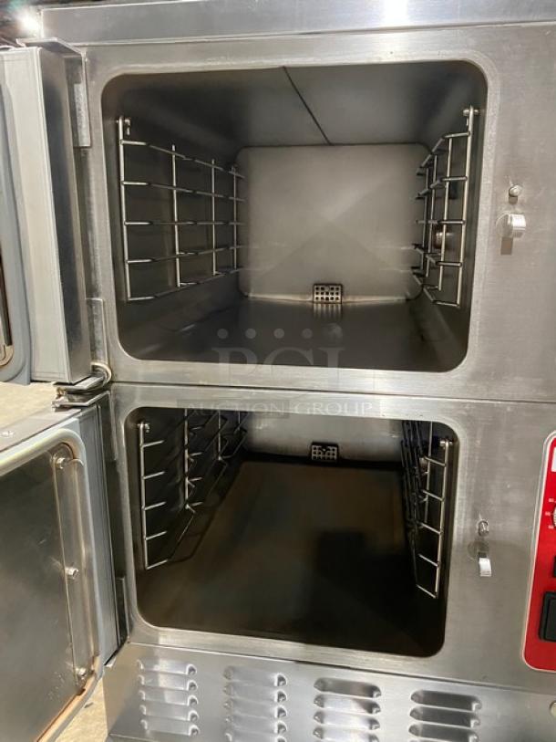 Vulcan VSX24G stainless steel dual compartment convection steamer, natural gas, individual controls, pan rack, on legs.