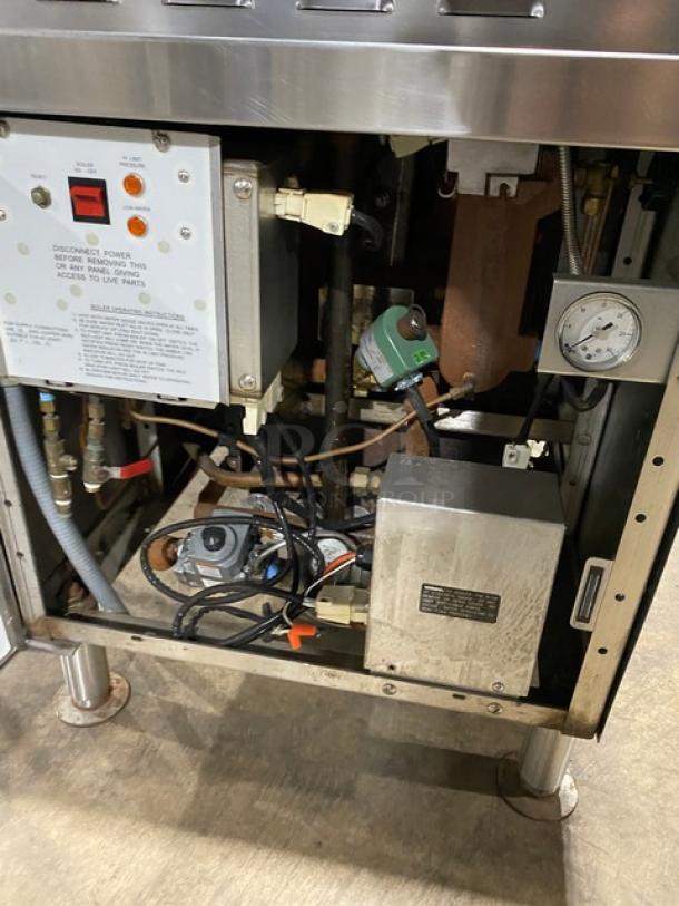 Vulcan VSX24G dual compartment convection steamer, stainless steel, natural gas, individual controls, pan rack, on legs.