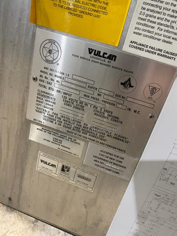 Vulcan VSX24G stainless steel commercial convection steamer, dual compartment, natural gas, 120V, with built-in pan rack.