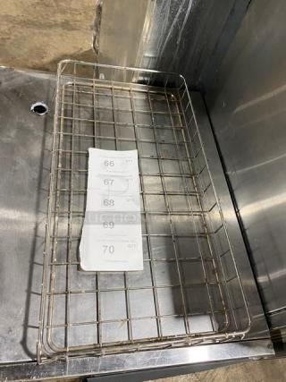 Commercial chrome-plated full-size bagel/pastry wired rack, metal grid design, minor wear, numbered tags attached.