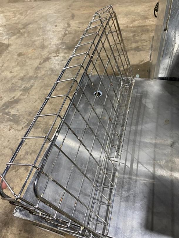 Commercial chrome plated full-size bagel/pastry wired rack in excellent condition, ideal for bakery display or storage.