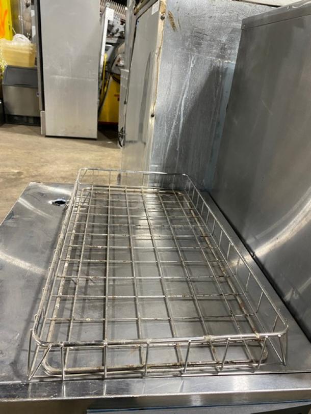 Commercial chrome-plated full-size bagel/pastry wired rack in good condition, grid design, ideal for displaying bakery items.