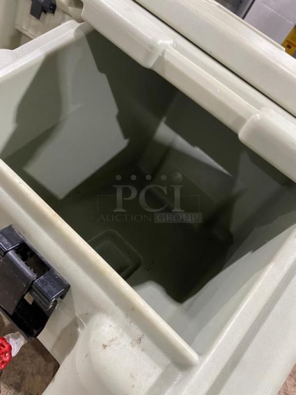 Cambro Commercial Insulated Ice Bin in beige. Durable plastic, spacious interior, secure latch, excellent condition.