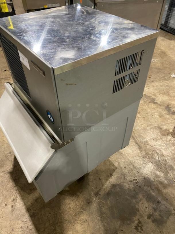 Hoshizaki KM-250BWE commercial ice machine with bin, stainless steel, air-cooled, 115-120V, on legs, model KM-250BWE.