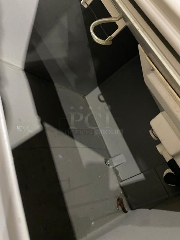 Hoshizaki KM-250BWE commercial ice maker interior, stainless steel, air-cooled, pristine condition, on legs, 115-120V, 1 phase.