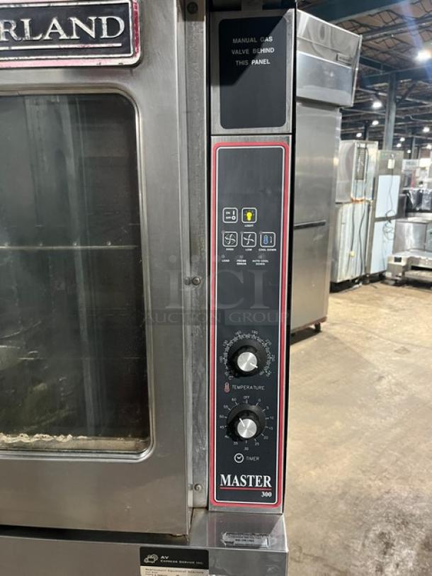 Garland Master 200/300 Series double-stacked convection oven, natural gas, view-through door, on commercial casters.