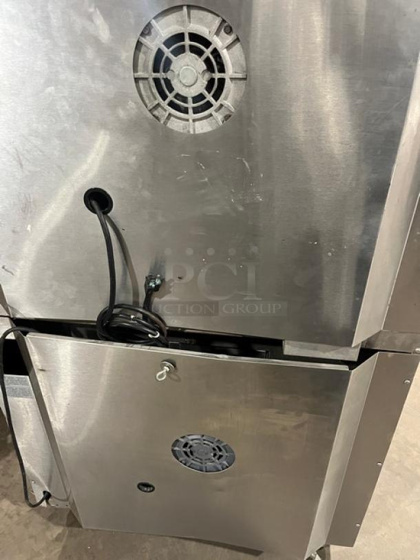 Garland Master 200/300 Series double stacked convection oven, stainless steel, natural gas, view-through doors, wire racks, on commercial casters.