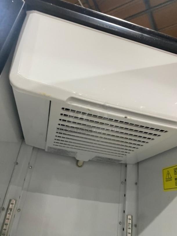 Imbrera VR08R6 commercial black glass door refrigerator interior, showing cooling unit, Energy Star certified.