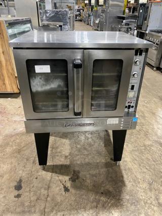 Southbend commercial stainless steel gas convection oven with thermostatic control, wired rack, on legs, good condition.