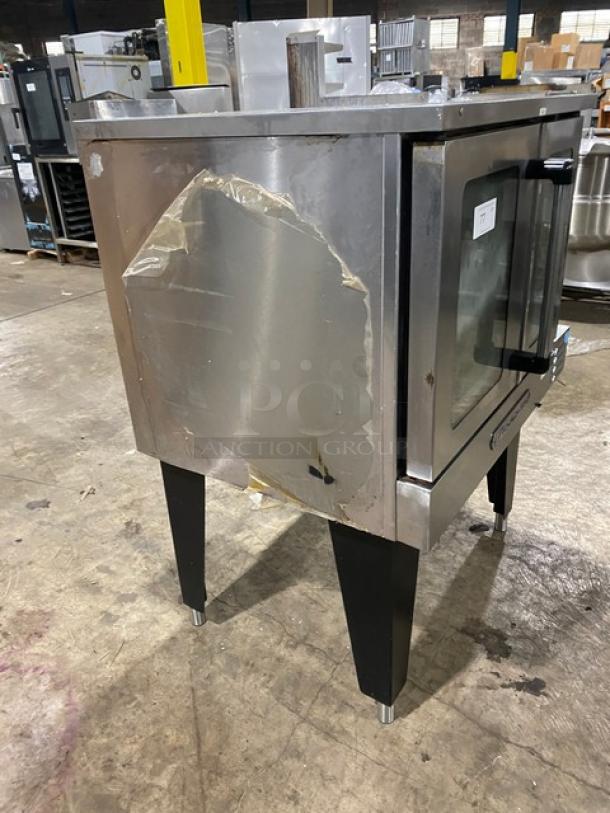 Southbend stainless steel gas convection oven with thermostatic control, single stacked, wired rack, on legs, used condition.