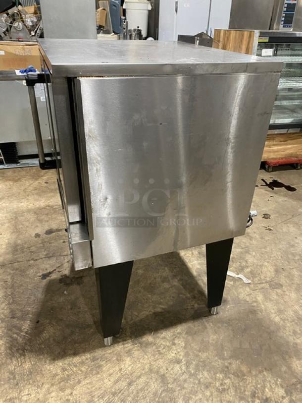Southbend stainless steel gas convection oven, single stacked, thermostatic control, wired oven rack, on sturdy legs.
