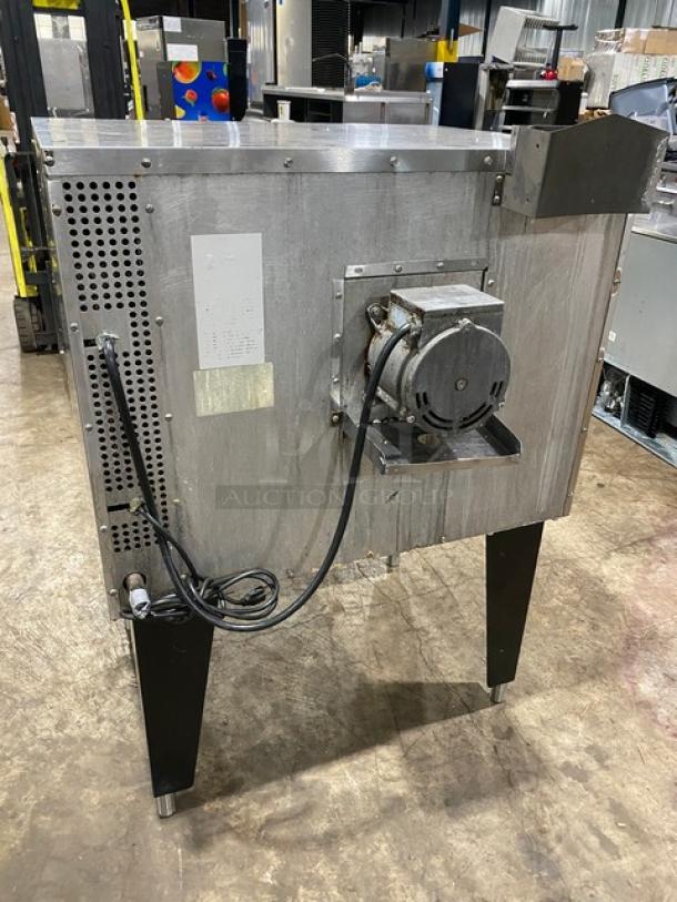 Southbend commercial stainless steel gas convection oven with thermostatic control, wired oven rack, on sturdy legs.