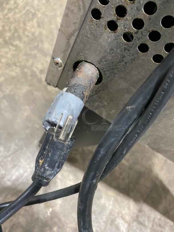 Southbend commercial stainless steel gas-powered convection oven plug and wiring detail. Visible wear on the connections.