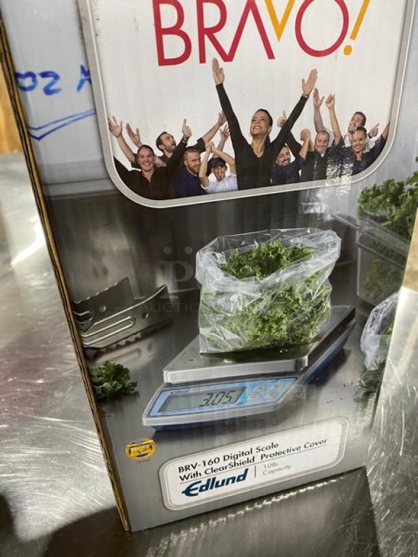 Edlund Bravo BRV-160 digital portion scale, new, 10 lb capacity, stainless steel, ClearShield cover, LCD display.