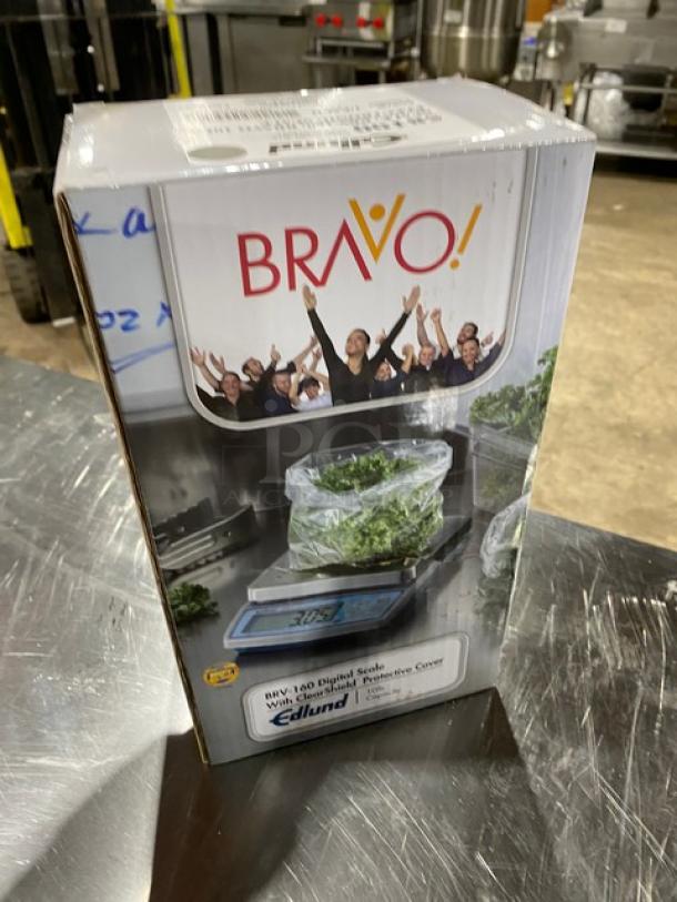 BRAND NEW Edlund Bravo Series BRV-160 digital portion scale in box; features ClearShield cover and LCD display.
