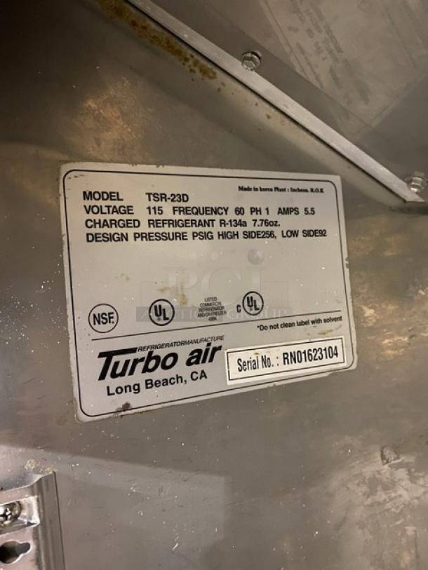 Turbo Air TSR-23D label on stainless steel commercial refrigerator. Details: 115V, R-134a, Serial RN01623104.