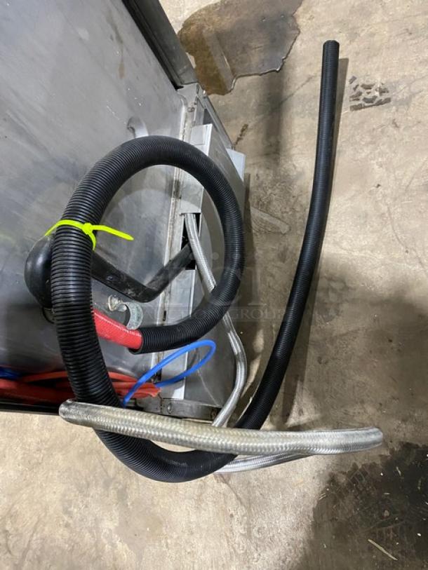 Hobart LXEH undercounter commercial dishwasher, stainless steel, electric, showing hoses and cables.