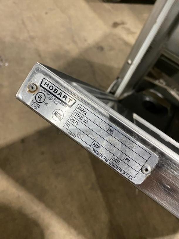 Hobart LXEH commercial stainless steel dishwasher, new body style, model tag showing serial number 23-1150-000.