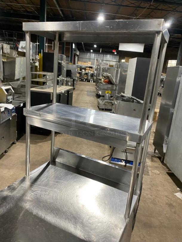 True TWT-27 single door stainless steel worktop refrigerator with backsplash, double overhead shelf, and poly-coated rack.