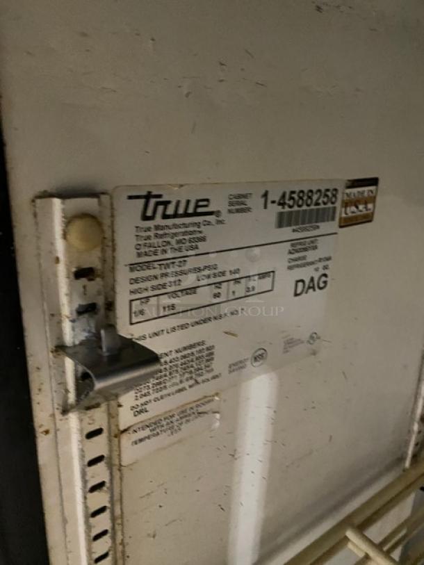 True TWT-27 worktop refrigerator label, showing serial number 1-4588258, 115V, stainless steel, includes poly coated rack.