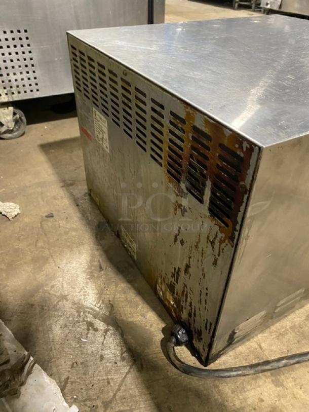 Bakers Pride P18 stainless steel electric pizza oven, single chamber double deck, 208/240V. Visible rust on side panel.