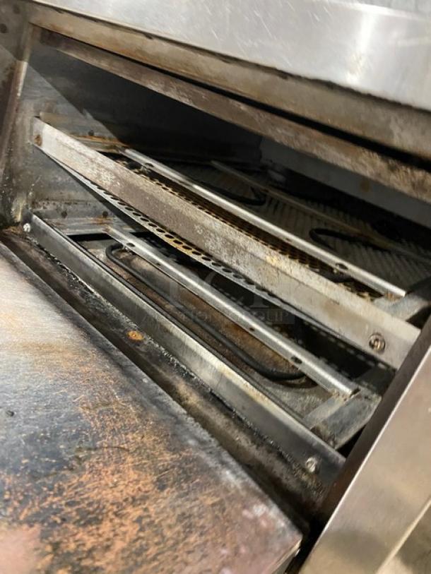 Bakers Pride P18 stainless steel electric pizza oven, single chamber, double deck, in used condition, 208/240V, 1 Phase.