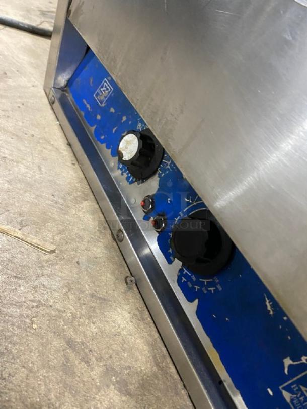 Bakers Pride P18 stainless steel electric pizza oven, single chamber, double deck, 208/240V, control knobs visible.