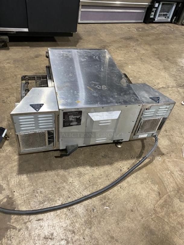 TurboChef HCS1618 stainless steel conveyor oven, electric 208/240V, 1 phase, used condition, with visible serial number label.