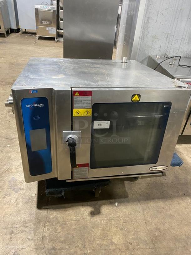Alto-Shaam 714ESISK combi convection oven, stainless steel, electric, 208-240V 3 Phase, visible labels, used condition.