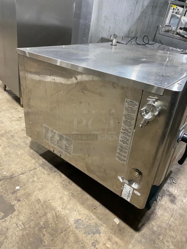 Alto-Shaam 714ESISK electric combi oven, stainless steel, 208-240V, 3-phase, visible labels, used condition.