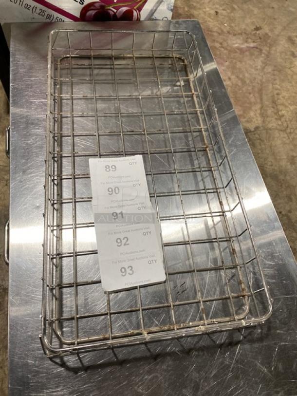 Commercial chrome plated full-size bagel/pastry wired rack, good condition, rectangular, wire grid design, includes item tag.