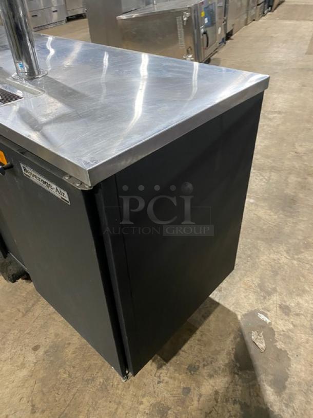 Beverage Air DD68 commercial kegerator with dual tower and 2 tap beer dispensers. Stainless steel top. Model and serial label visible.
