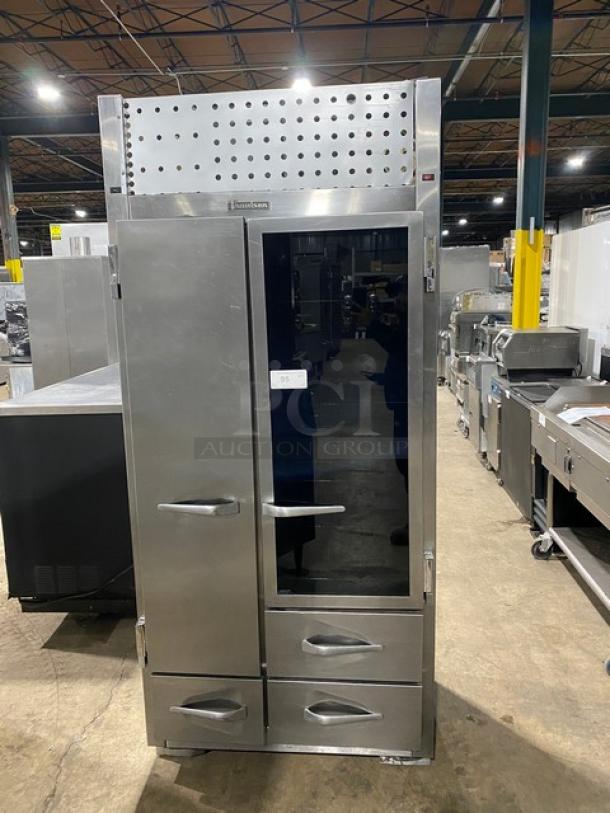 Traulsen stainless steel 2-door, 3-drawer refrigerator/freezer combo, model URS36DT, with chrome racks, in good condition.