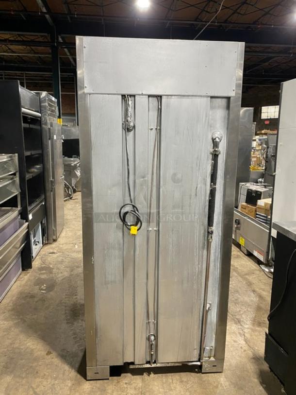 Traulsen stainless steel 2-door, 3-drawer refrigerator/freezer combo, Model URS36DT, in good condition, with wiring visible.