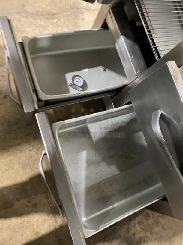 Traulsen stainless steel 2-door, 3-drawer refrigerator/freezer combo, model URS36DT, with chrome racks, 115V, used condition.