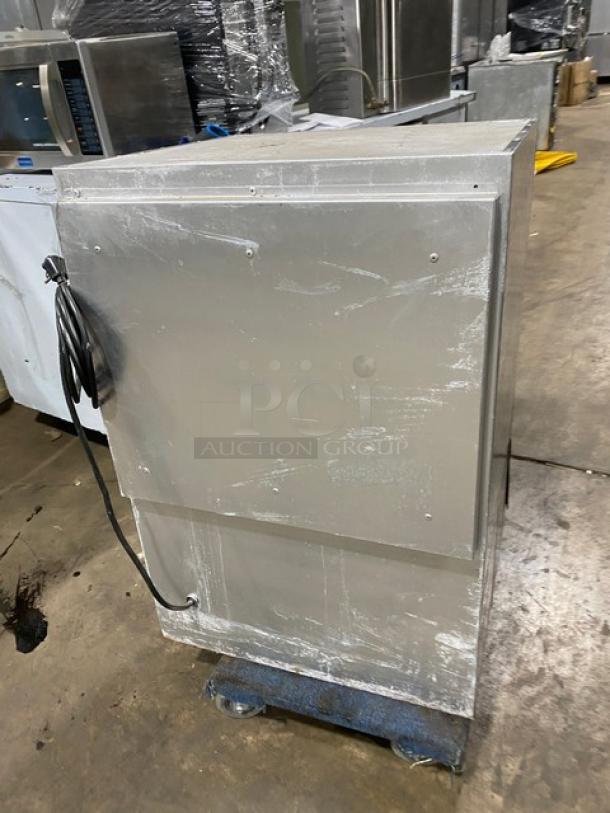 Glastender MFV24GNL mug chiller, stainless steel, 2018 model, single glass door, includes poly-coated rack, 120V, good condition.