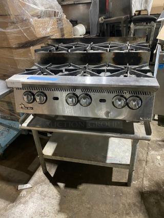 Star Ultra-Max Series 6-burner hot plate, model 806HA8U, stainless steel, thermostatic controls, used condition, on stand.