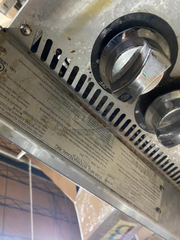 Star Ultra-Max Series 6 Burner Hot Plate, Model 806HA8U, stainless steel, thermostatic controls, on legs, label visible.