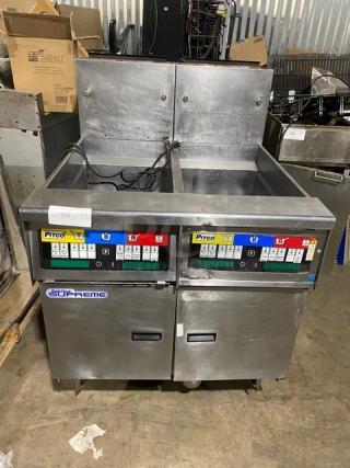 Pitco Solstice Supreme SSH55 stainless steel 2-bay 50Lb. deep fat fryer, natural gas, with filtration system, on casters.