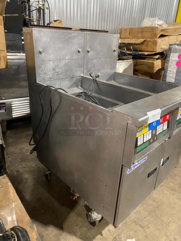 Pitco Solstice Supreme SSH55 2-bay stainless steel fryer with filtration, backsplash, basket hanger; on casters; natural gas.