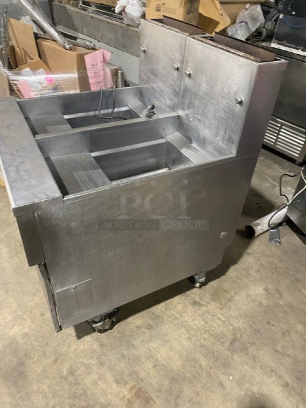 Pitco Solstice Supreme Series SSH55 stainless steel 2-bay fryer. Includes filtration system, basket hanger, and casters.