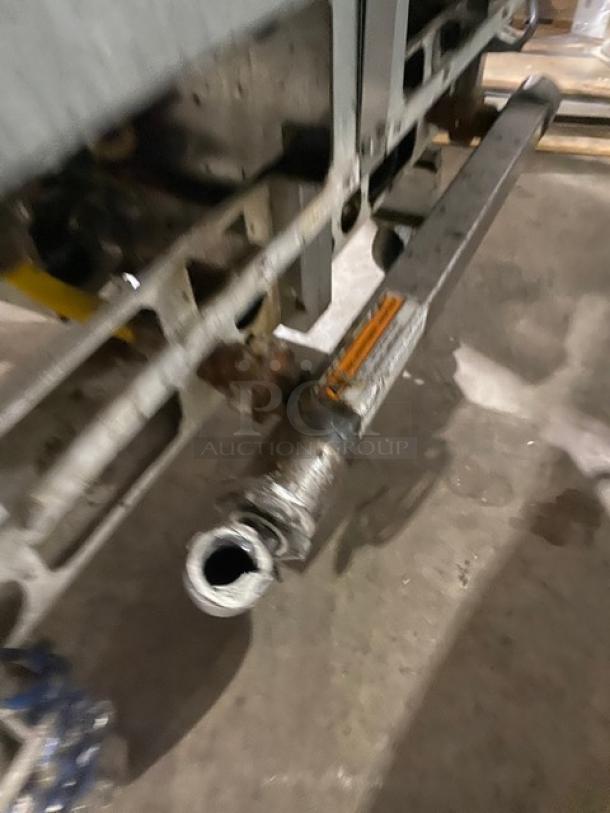 Pitco Solstice Supreme SSH55 commercial stainless steel 2-bay deep fat fryer, natural gas, with filtration system and casters.